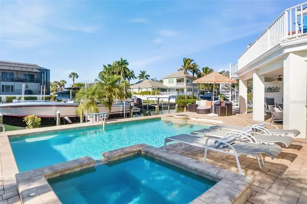 a kitchen with cabinets appliances and a counter space