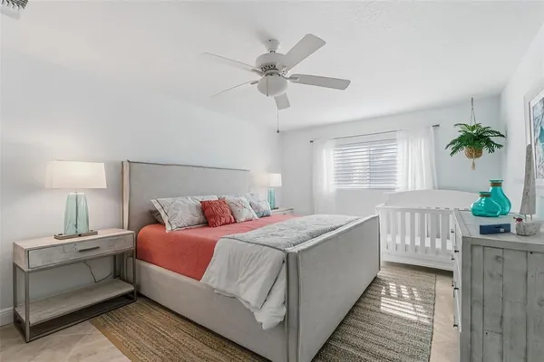 a bathroom with a toilet sink and a mirror