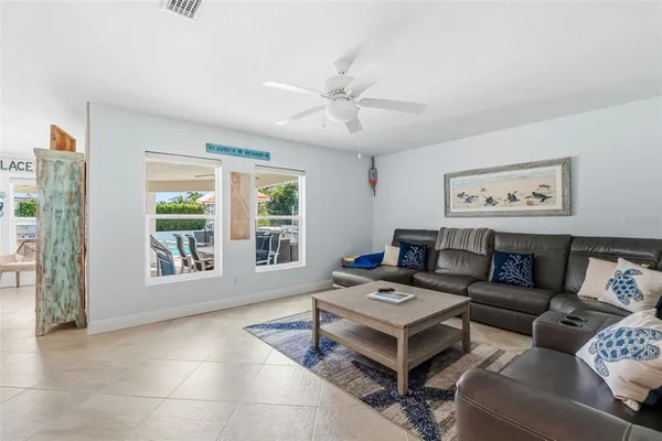 a view of a swimming pool with a patio