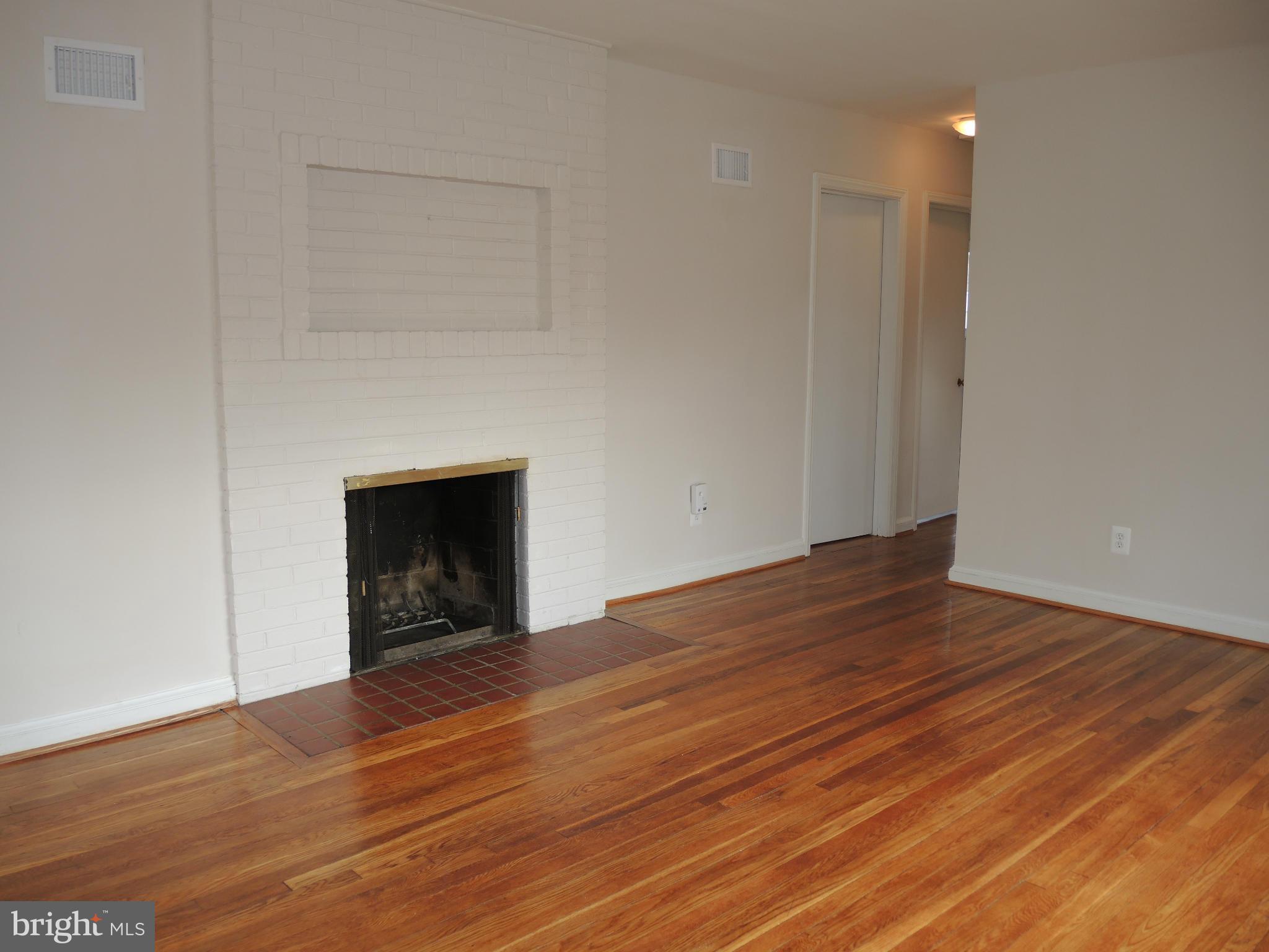 6711 Adelphi Road University Park, MD 20782 - Photo 6 of 19 fireplace in the living room