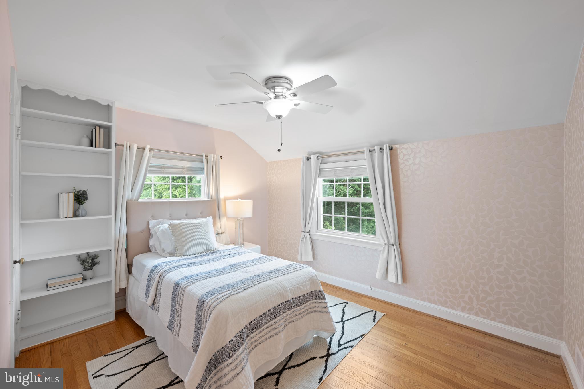 403 East Melbourne Avenue Silver Spring, MD 20901 - Photo 20 of 33 a bedroom with a large bed and a window
