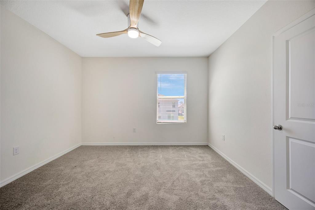 5758 Hollingworth Trail Wesley Chapel, FL 33545 - Photo 17 of 33 a view of room and window