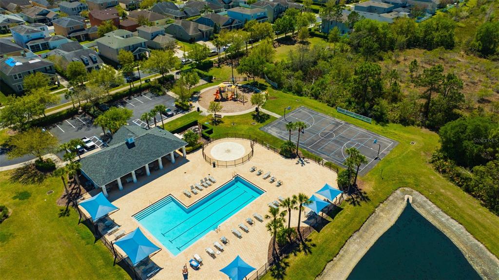 5758 Hollingworth Trail Wesley Chapel, FL 33545 - Photo 24 of 33 an aerial view of a house with a ocean view