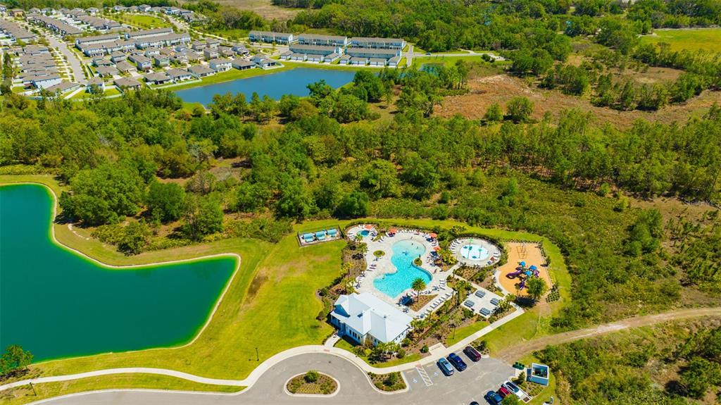 5758 Hollingworth Trail Wesley Chapel, FL 33545 - Photo 25 of 33 an aerial view of a swimming pool and outdoor space