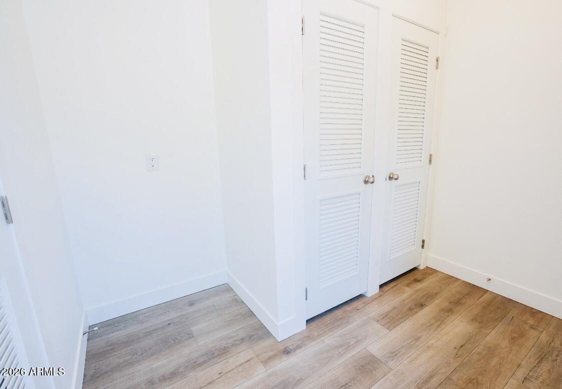 4710 Lazy Lariat Lane Rimrock, AZ 86335 - Photo 11 of 19 a view of a small space with wooden floor and a window