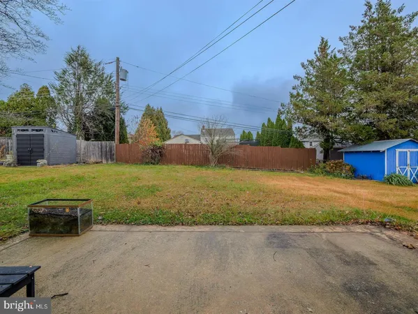 a view of backyard with outdoor space