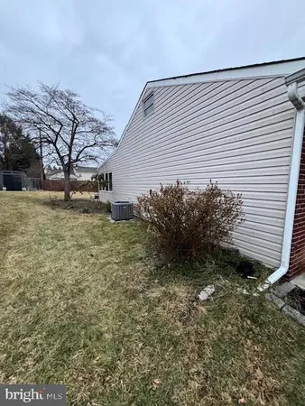 a view of a street with some trees