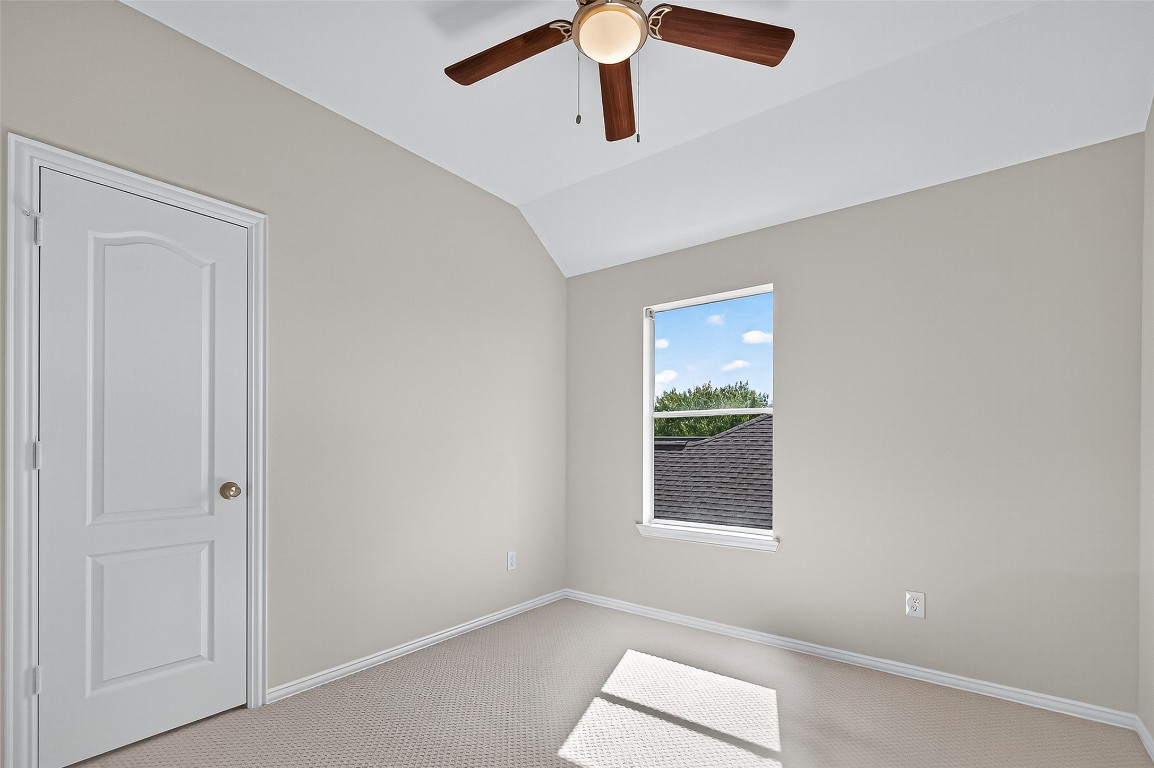 21310 Timber Pines Drive Spring, TX 77388 - Photo 41 of 49 wooden floor in an empty room with a window