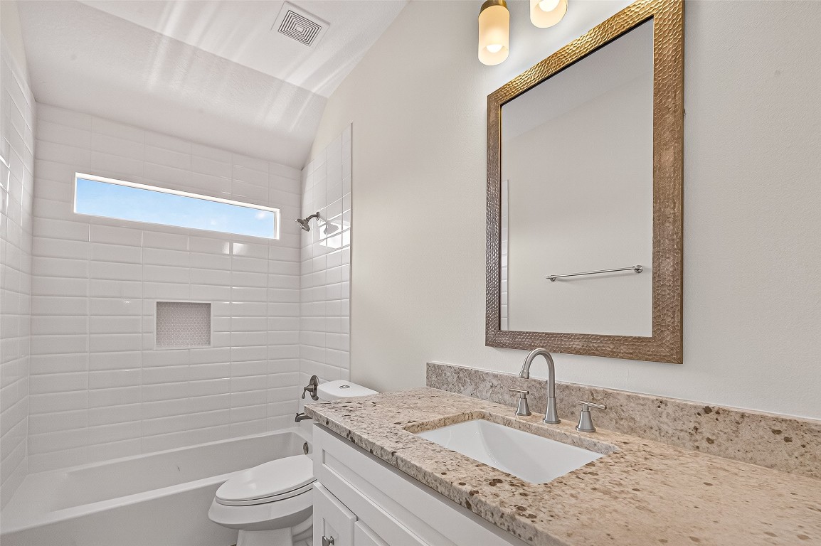 21310 Timber Pines Drive Spring, TX 77388 - Photo 43 of 49 a bathroom with a granite countertop sink toilet and shower