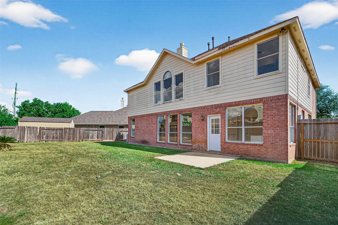 21310 Timber Pines Drive Spring, TX 77388 - Photo 46 of 49 front view of a house with a yard