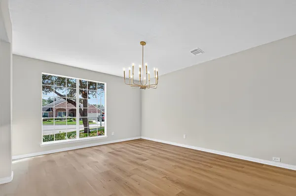a view of a chandelier in a room