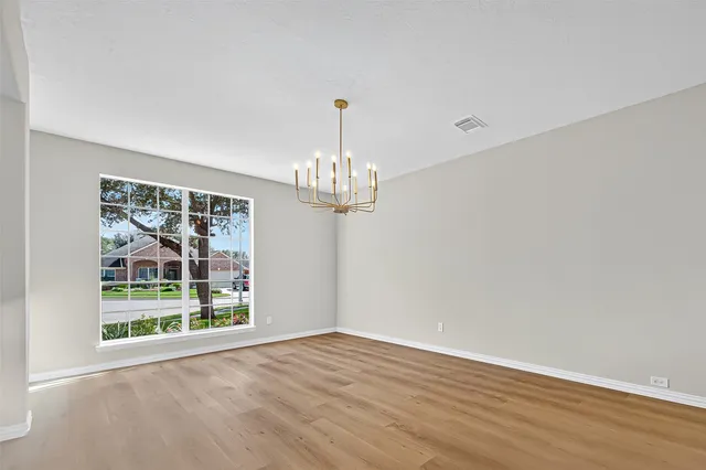a view of a chandelier in a room