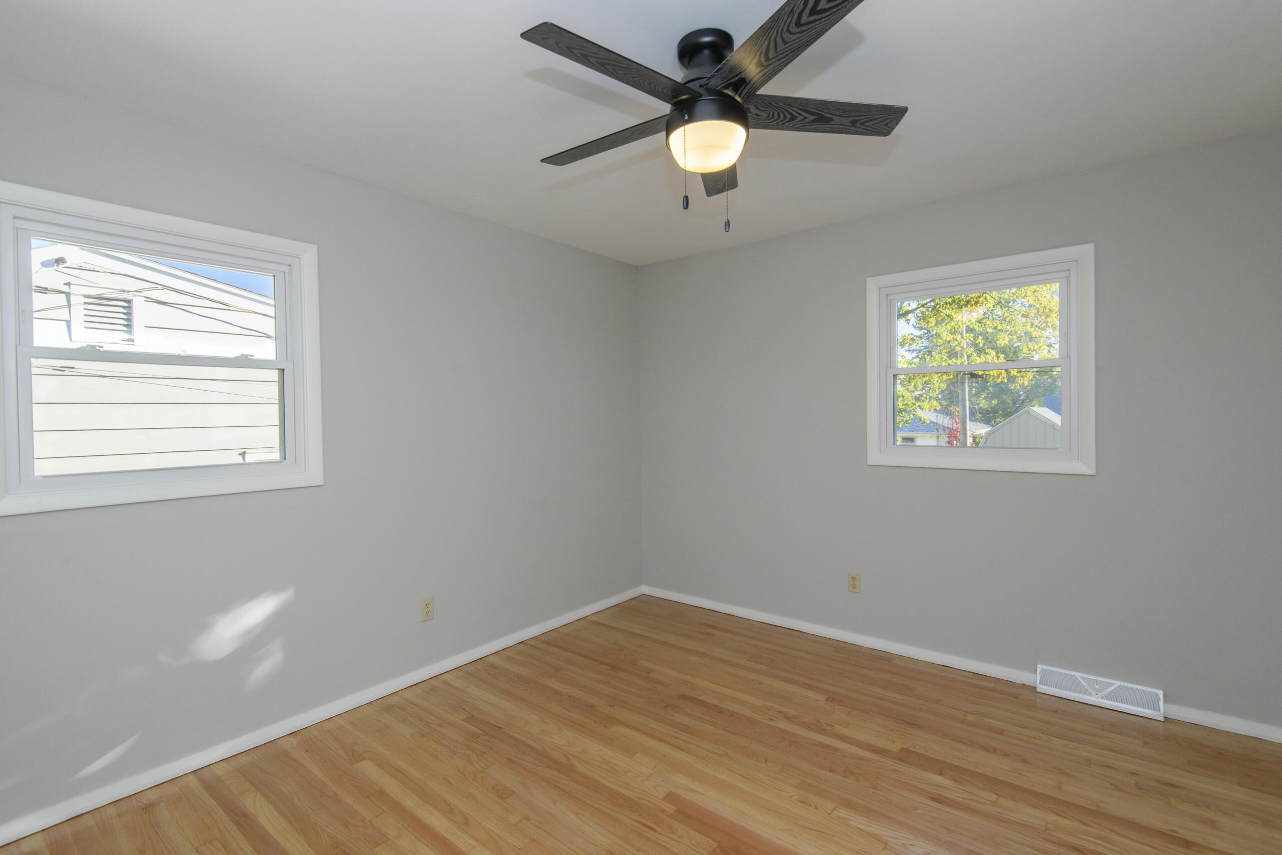 5970 South 34th Street Greenfield, WI 53221 - Photo 10 of 25 Primary Bedroom w/Hardwood Floors