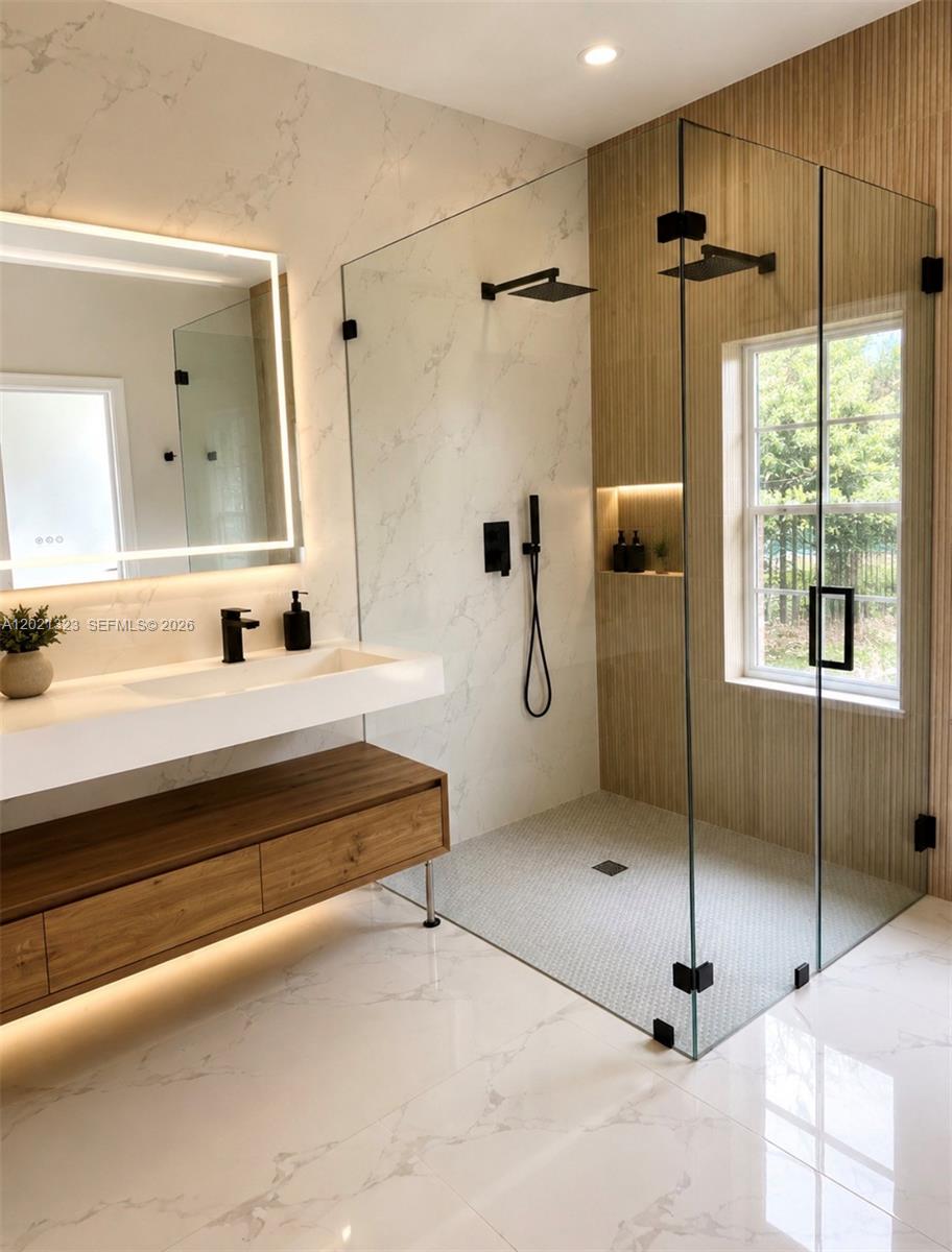 354 Mallard Road, Unit O Weston, FL 33327 - Photo 4 of 29 a bathroom with a tub sink and mirror