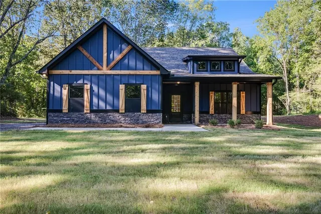 a front view of a house with swimming pool