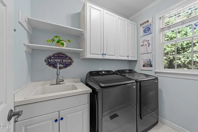 a kitchen with a stove and a cabinets