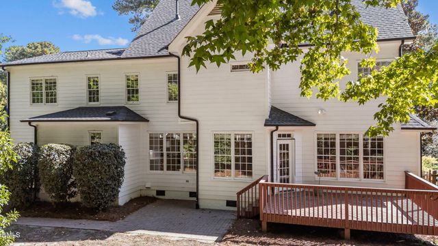 front view of a house with a large window