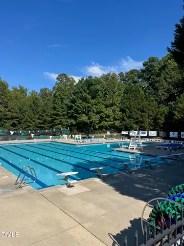 a view of a yard and front view of a house