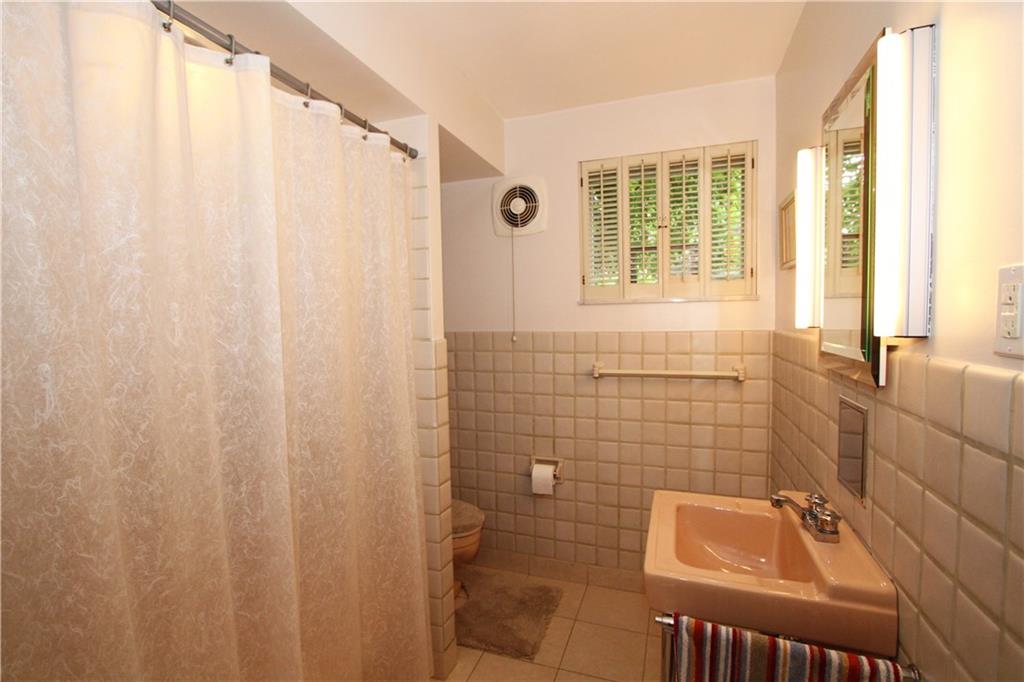 245 Tech Road Thornburg, PA 15205 - Photo 14 of 25 Full bath on main with lovely marble tile flooring.