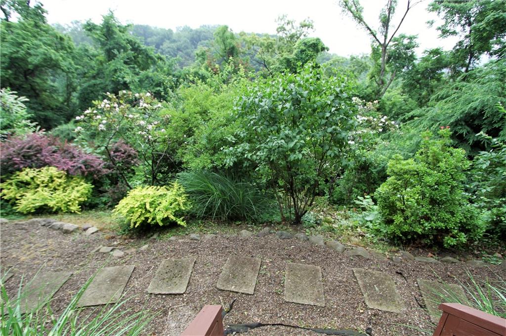 245 Tech Road Thornburg, PA 15205 - Photo 24 of 25 Hillside landscaping and walkway, view from lower deck stairs.