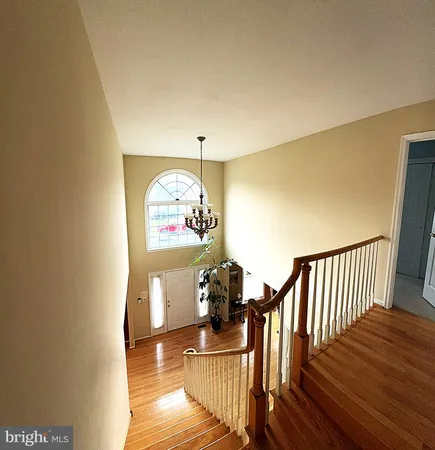 a view of a balcony dining table and chairs