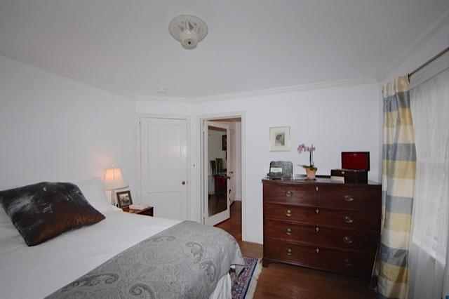 27 Range Road Rowayton, CT 06853 - Photo 13 of 21 a bedroom with a bed and a dresser