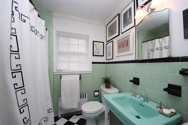 27 Range Road Rowayton, CT 06853 - Photo 18 of 21 a bathroom with a sink a toilet and a mirror
