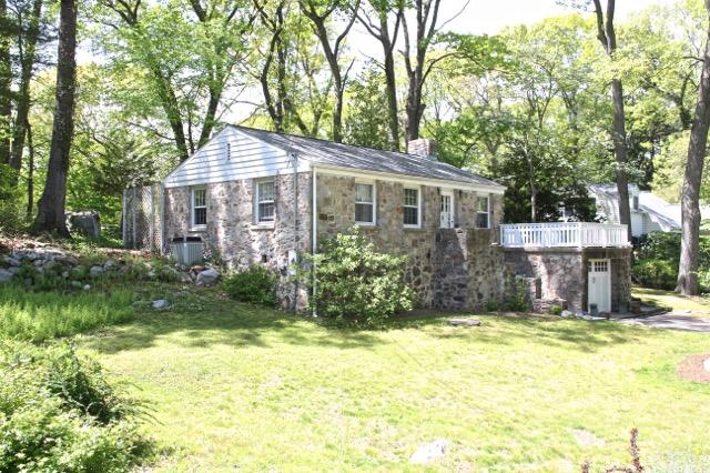 27 Range Road Rowayton, CT 06853 - Photo 2 of 21 a view of a house with garden and trees