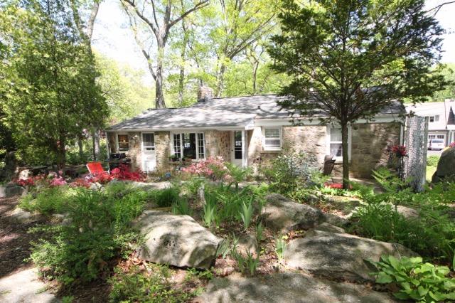27 Range Road Rowayton, CT 06853 - Photo 3 of 21 a view of a house with a yard and garden