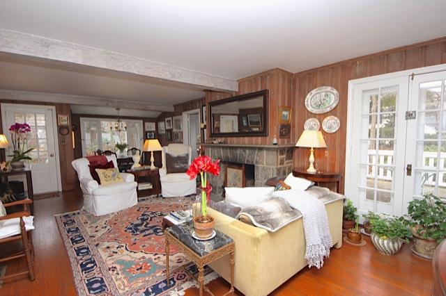 27 Range Road Rowayton, CT 06853 - Photo 5 of 21 a living room with furniture a fireplace and a flat screen tv