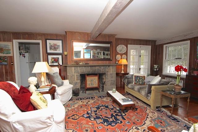 27 Range Road Rowayton, CT 06853 - Photo 6 of 21 a living room with furniture and a fireplace