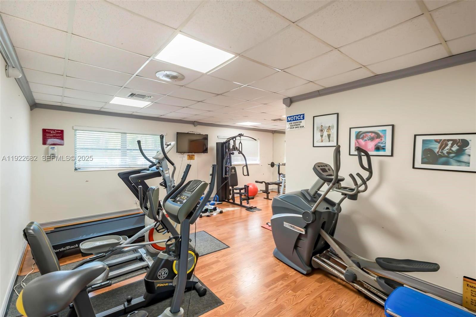 2300 Southwest 22nd Avenue, Unit 109 Delray Beach, FL 33445 - Photo 39 of 49 a view of a room with gym equipment