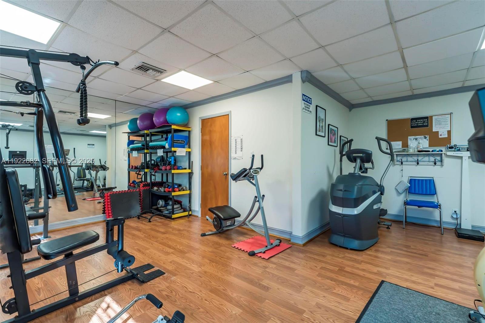 2300 Southwest 22nd Avenue, Unit 109 Delray Beach, FL 33445 - Photo 40 of 49 a view of a room with gym equipment