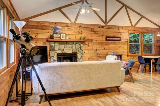 a living room with a fireplace and a stove