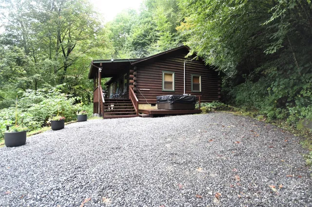a view of house with trees in the background
