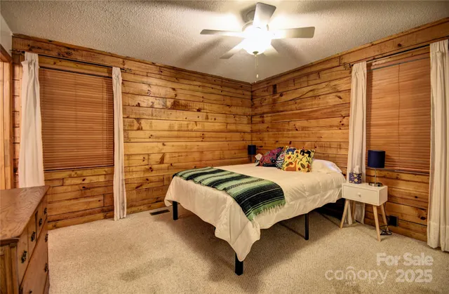 a bedroom with a bed and a walk in closet