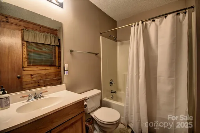 a bedroom with a bed and a walk in closet