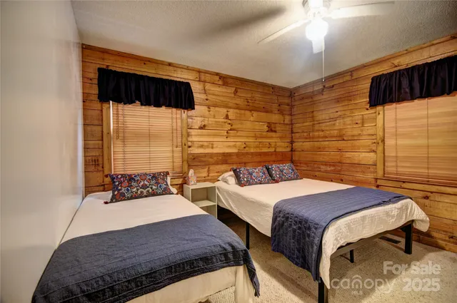 a bedroom with a bed and furniture