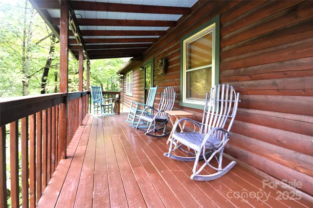 a view of a chairs in wooden deck