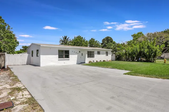 front view of a house with a street