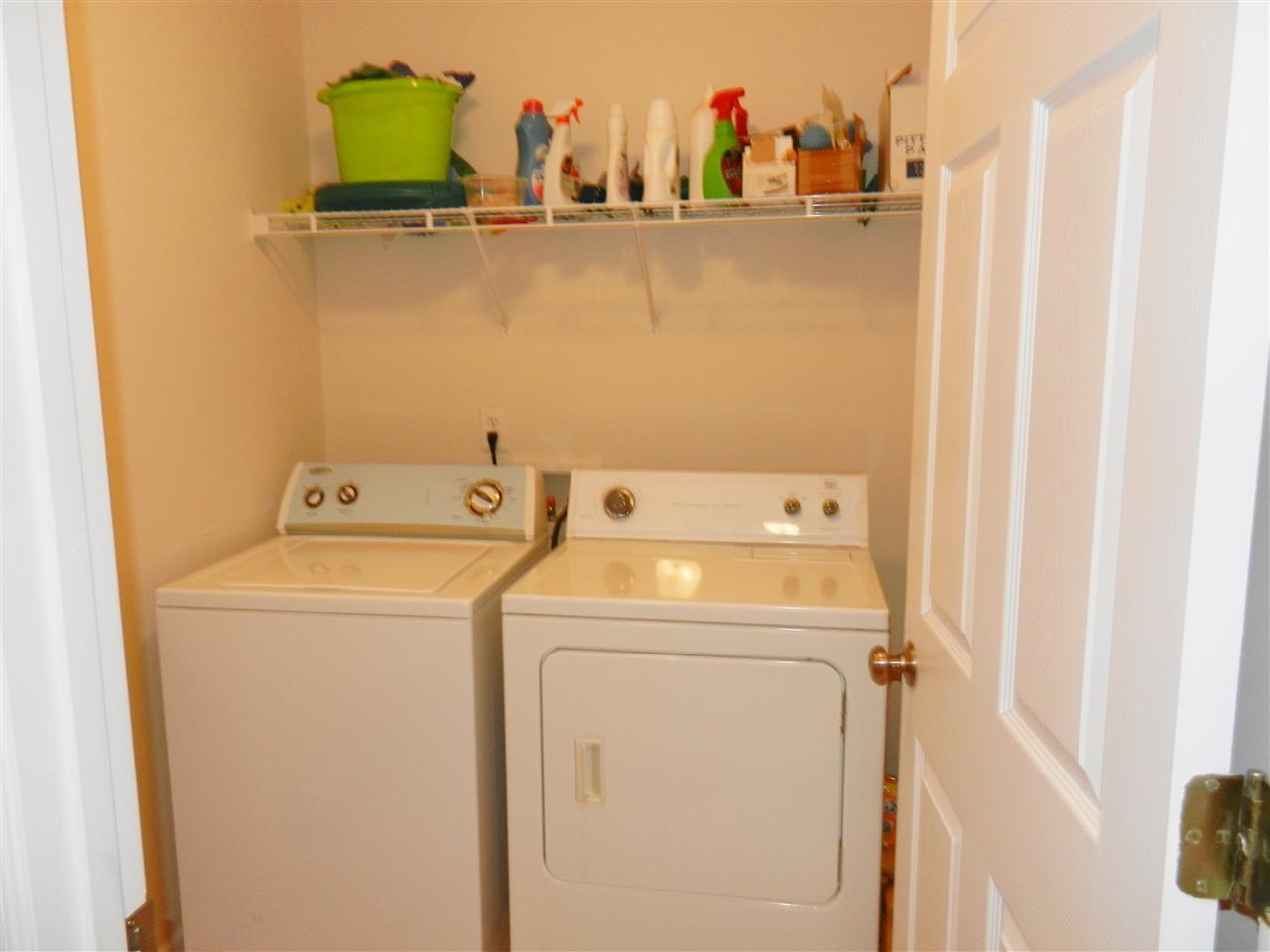 245 Saddle Ridge Drive Willow Spring, NC 27592 - Photo 19 of 24 a utility room with dryer and washer