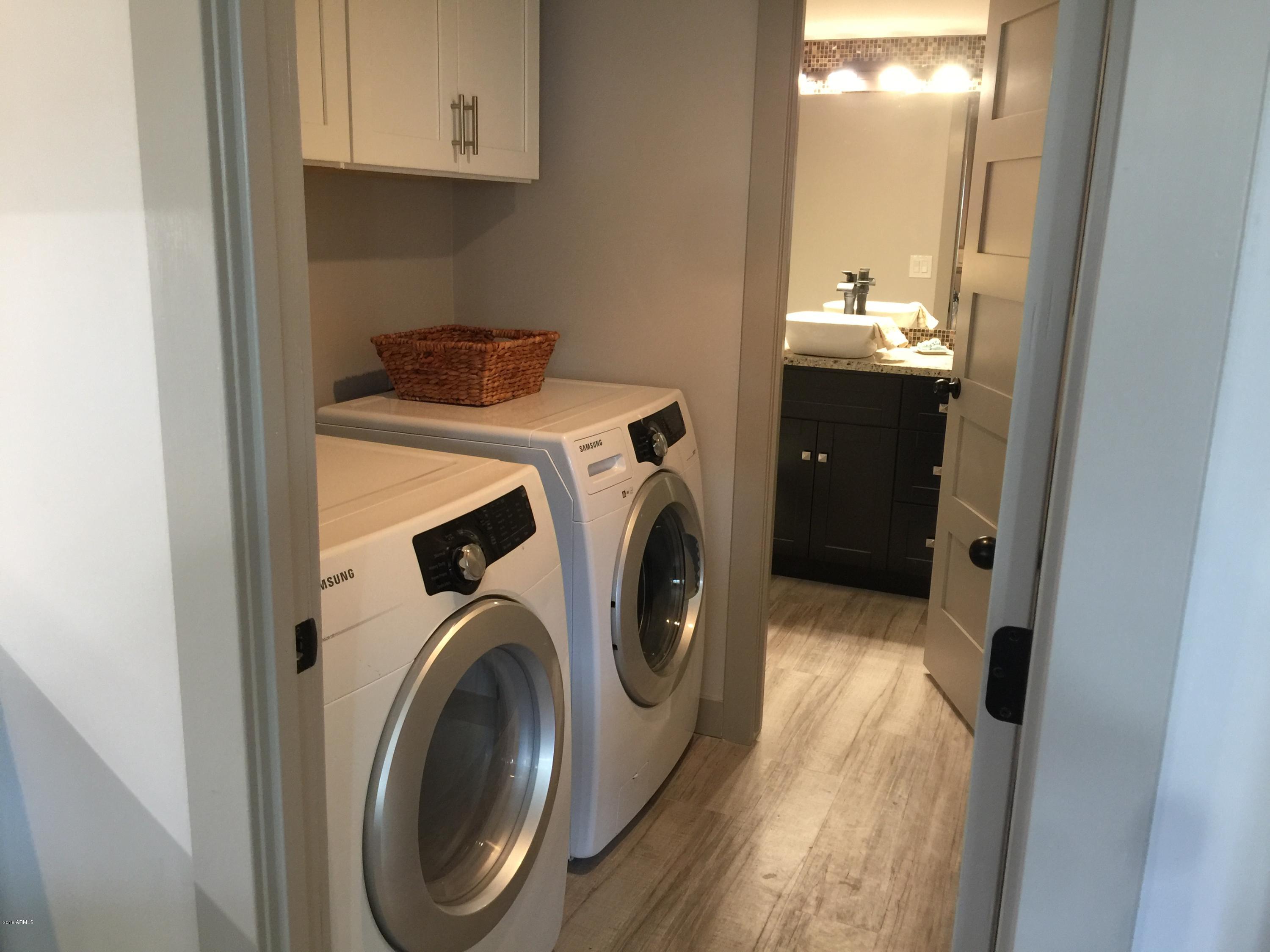 4221 North Miller Road Scottsdale, AZ 85251 - Photo 11 of 20 a utility room with dryer and washer