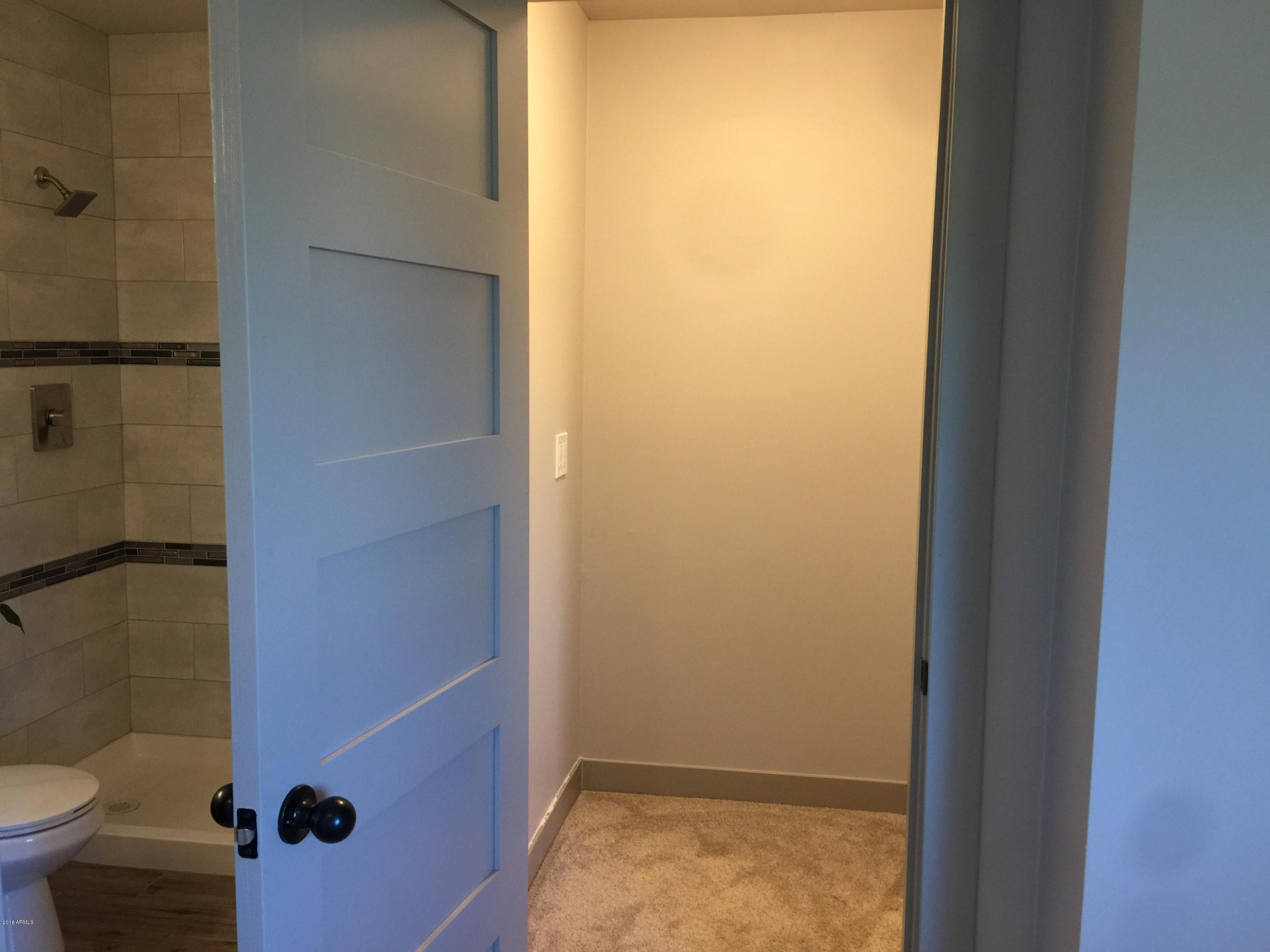 4221 North Miller Road Scottsdale, AZ 85251 - Photo 16 of 20 a bathroom with a toilet