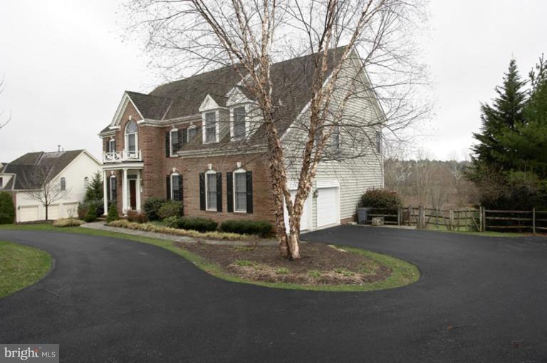 8524 Churchill Downs Road Gaithersburg, MD 20882 - Photo 26 of 30 2-car garage and circular driveway.
