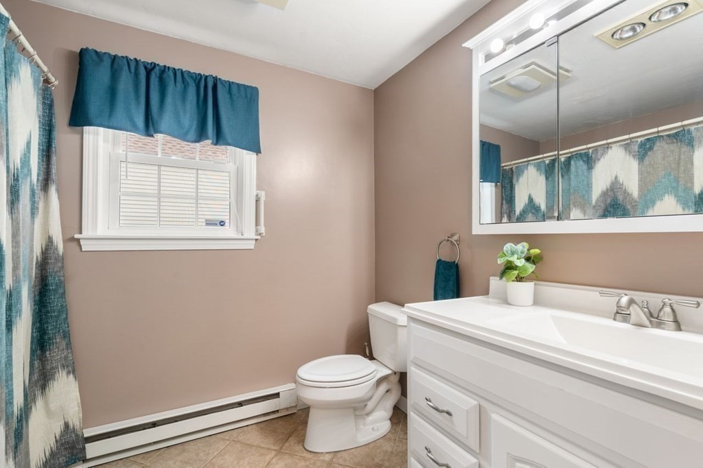 23 Arnold Road Douglas, MA 01516 - Photo 13 of 36 a bathroom with a sink a toilet and shower