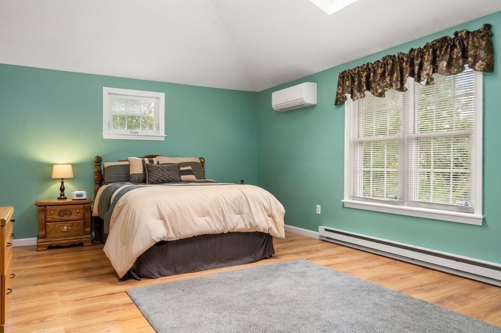 23 Arnold Road Douglas, MA 01516 - Photo 17 of 36 a bedroom with a bed and a window