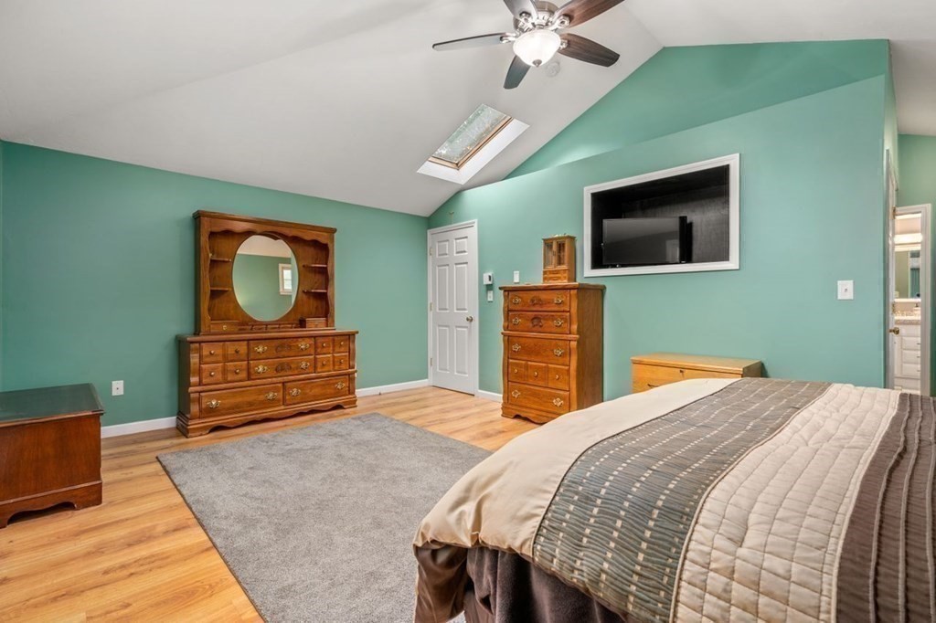 23 Arnold Road Douglas, MA 01516 - Photo 19 of 36 a bedroom with a bed and a dresser