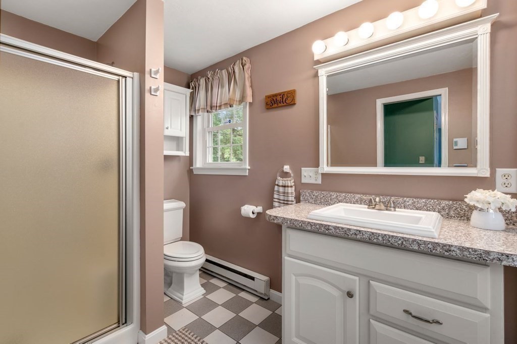 23 Arnold Road Douglas, MA 01516 - Photo 21 of 36 a bathroom with a granite countertop sink toilet and shower