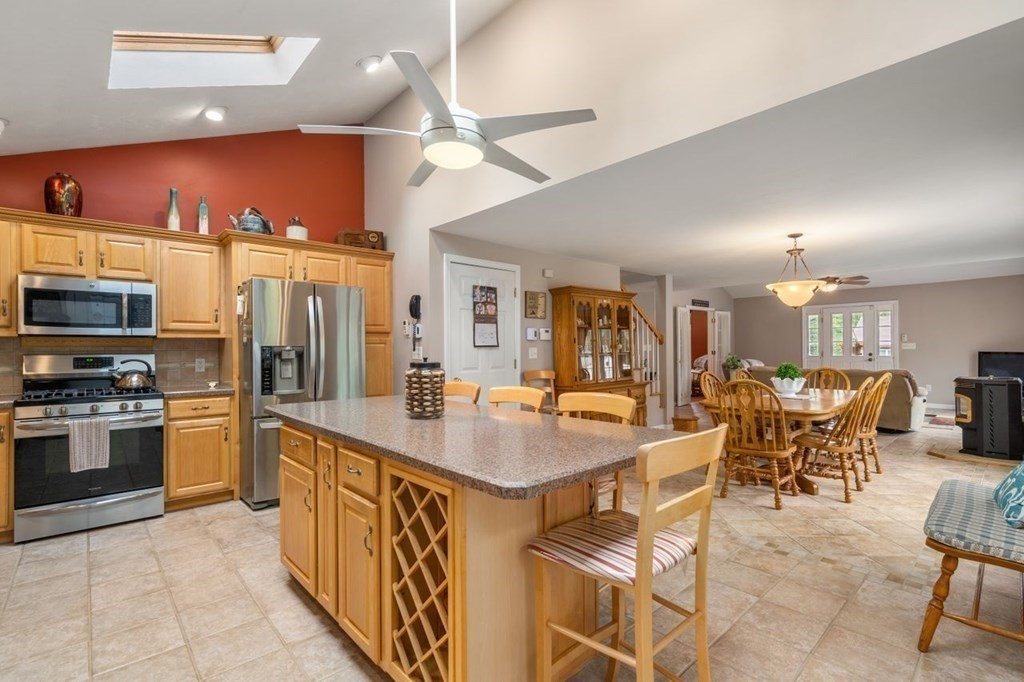 23 Arnold Road Douglas, MA 01516 - Photo 3 of 36 a large kitchen with stainless steel appliances lots of counter space and breakfast area