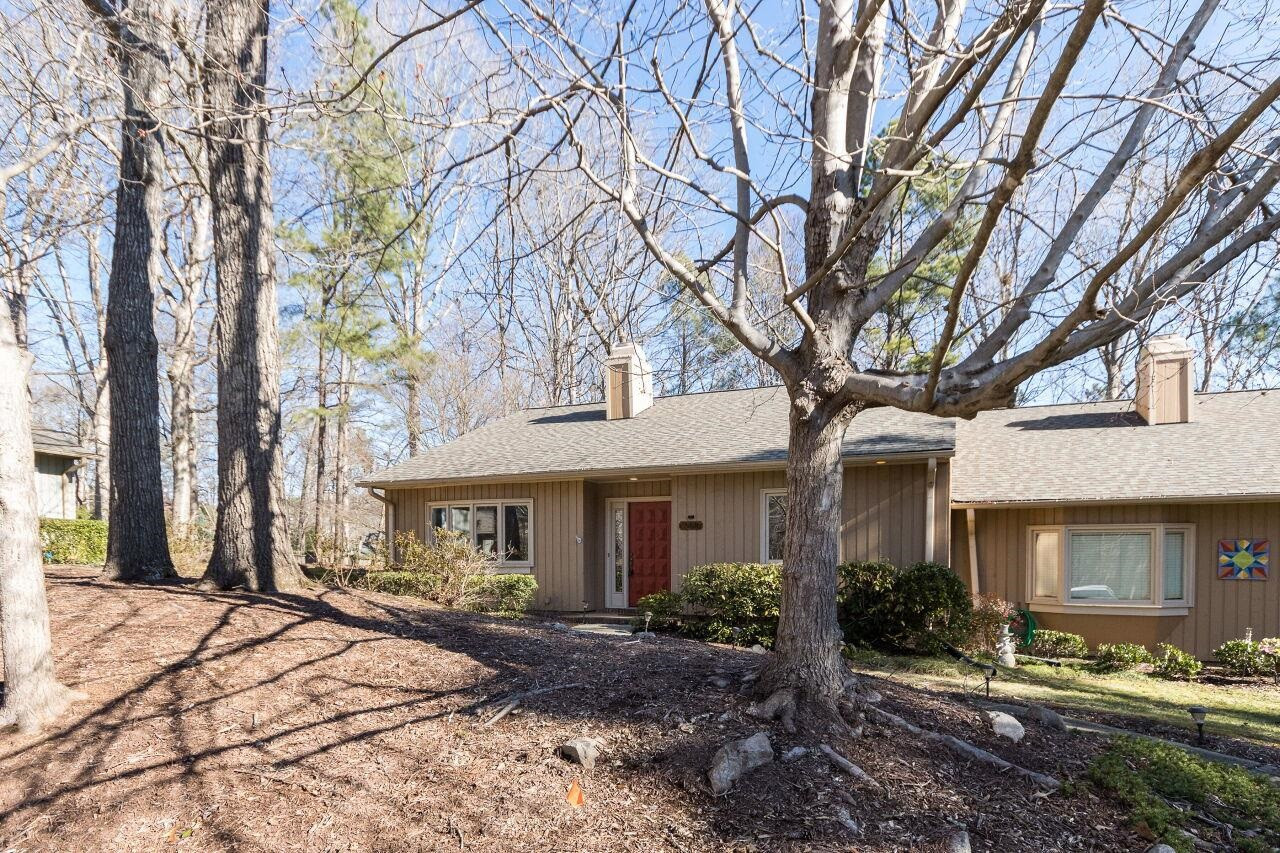 718 Red Forest Trail Raleigh, NC 27615 - Photo 30 of 30 Large front yard with big beautiful trees that will be full of spring blossoms soon. Exterior Front